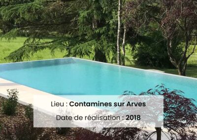 Piscine débordement sur 2 côtés, Mur de soutènement et palissade granit, terrasse en pierre calcaire